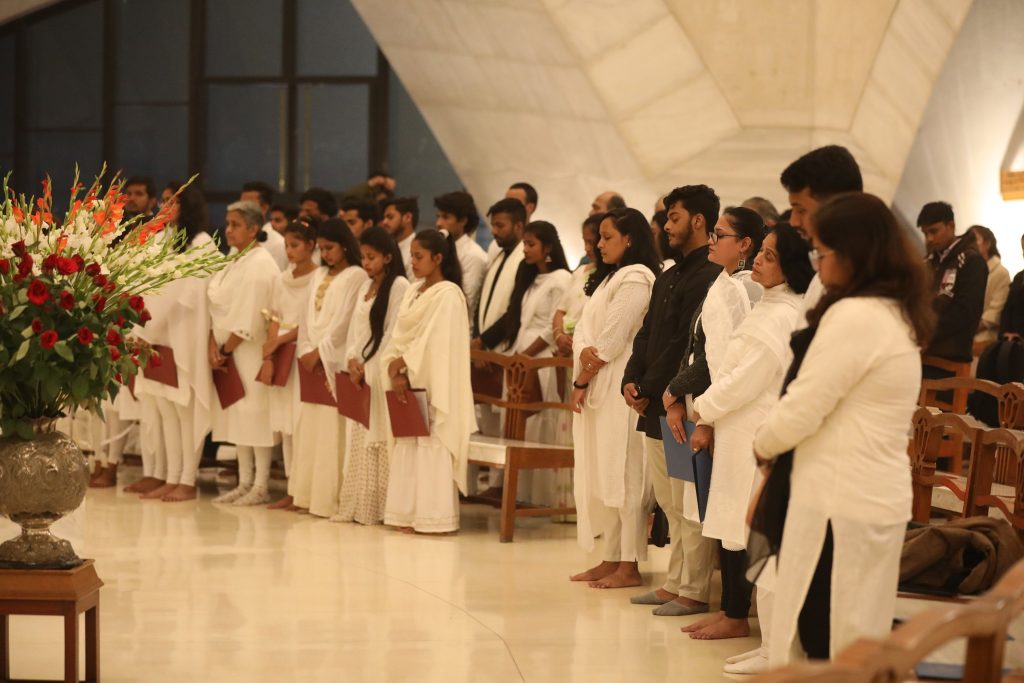 The centenary program at the New Delhi House of Worship included devotions and readings of passages from the Bahá’í writings.